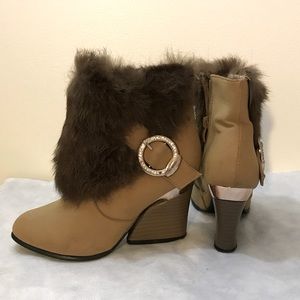 Tan ankle booties with brown fur decors